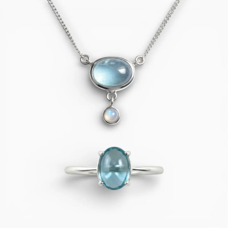 Parure bijoux topaze bleue et argent 925 Duo Azur Céleste, ensemble bague Aura et collier Sillage.